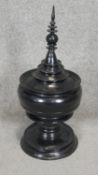 A Burmese black lacquered food offering vessel with red interior. H.60 D.28cm