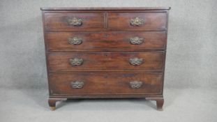 A Georgian mahogany chest of drawers on shaped bracket feet. H.92 W.110 D.53