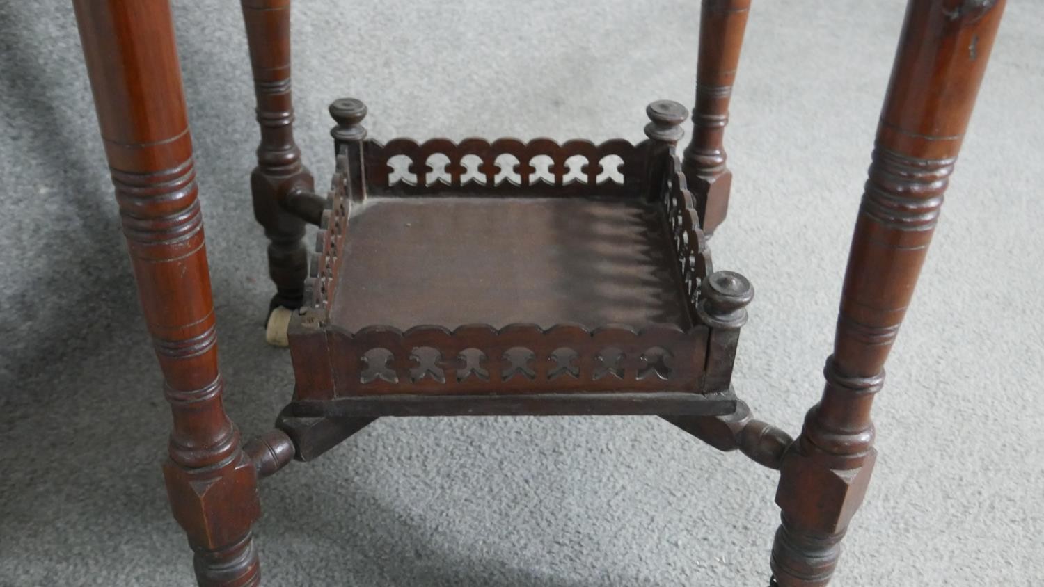 A 19th century mahogany occasional table on turned tapering supports united by galleried - Image 4 of 4
