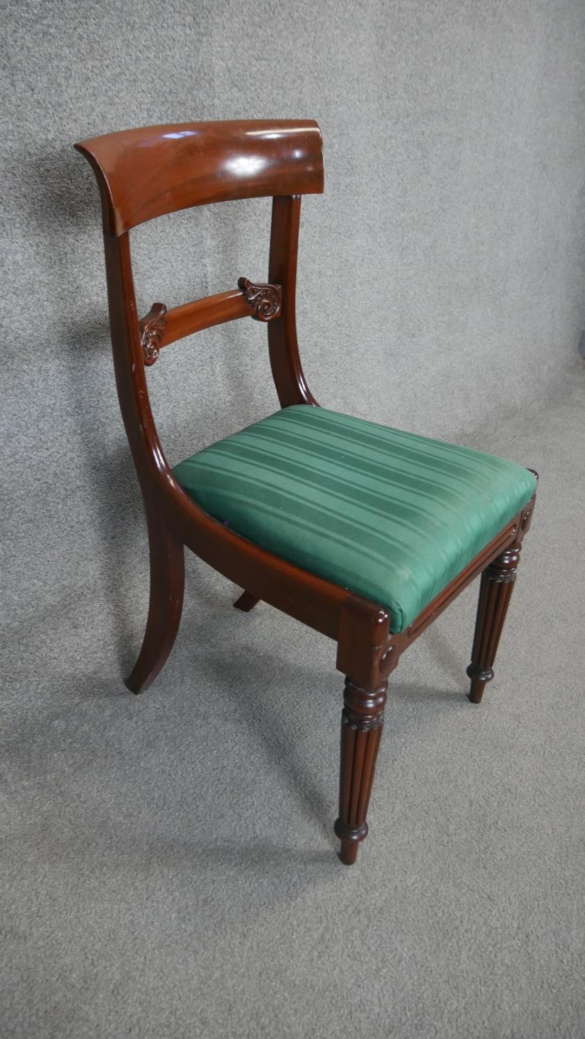 A set of six William IV mahogany dining chairs with acanthus carved backs and drop in seats on - Image 4 of 4