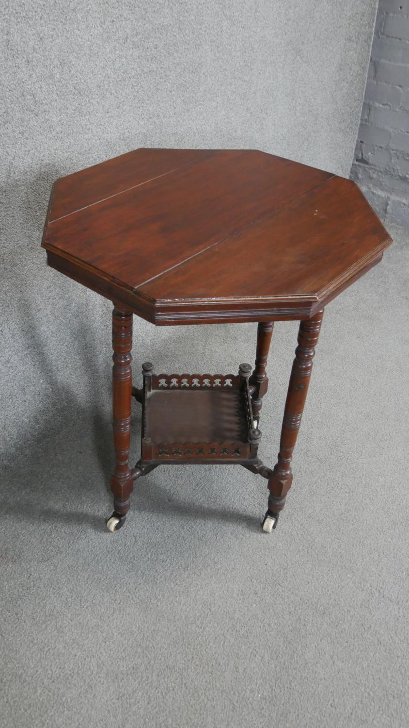 A 19th century mahogany occasional table on turned tapering supports united by galleried - Image 3 of 4