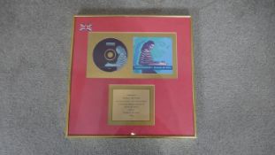A framed and glazed presentation disc for the sale of 400,000 copies of Brimful of Asha by