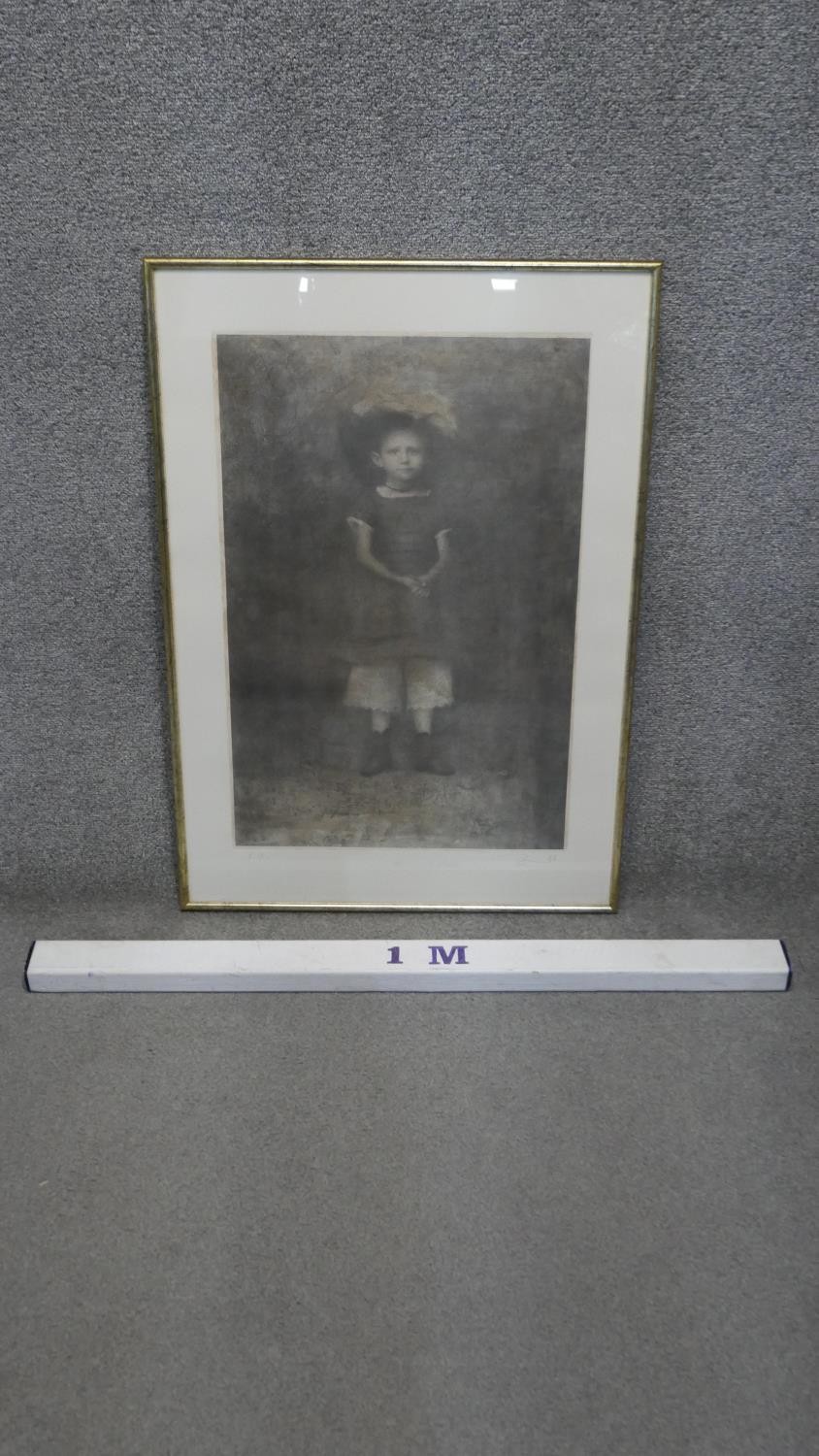 A framed and glazed signed artists proof lithograph of a young boy in a feather hat. Indistinctly - Image 3 of 5