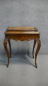 A 19th century walnut and floral marquetry inlaid jardiniere stand with panel top revealing lift out