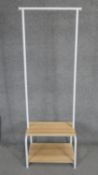 A contemporary hall coat rack fitted with boot shelves to the base. H.165 x W.54 x D.42cm