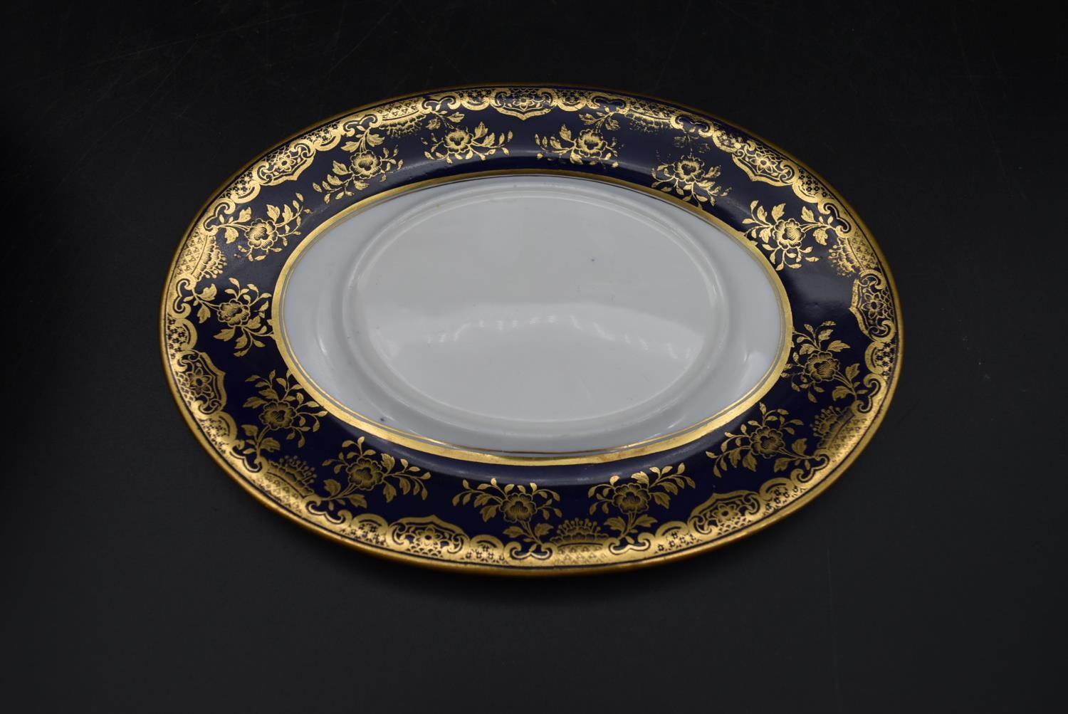 A Wedgwood gilded stylised foliate design part dinner service. Including 9 plates, 8 small plates, 4 - Image 6 of 21