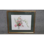 A framed and glazed watercolour of a vase of flowers. Signed. H.60 x W.70cm