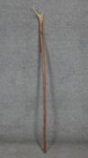 A vintage deer antler handled walking sticks with leather strap. H. 130