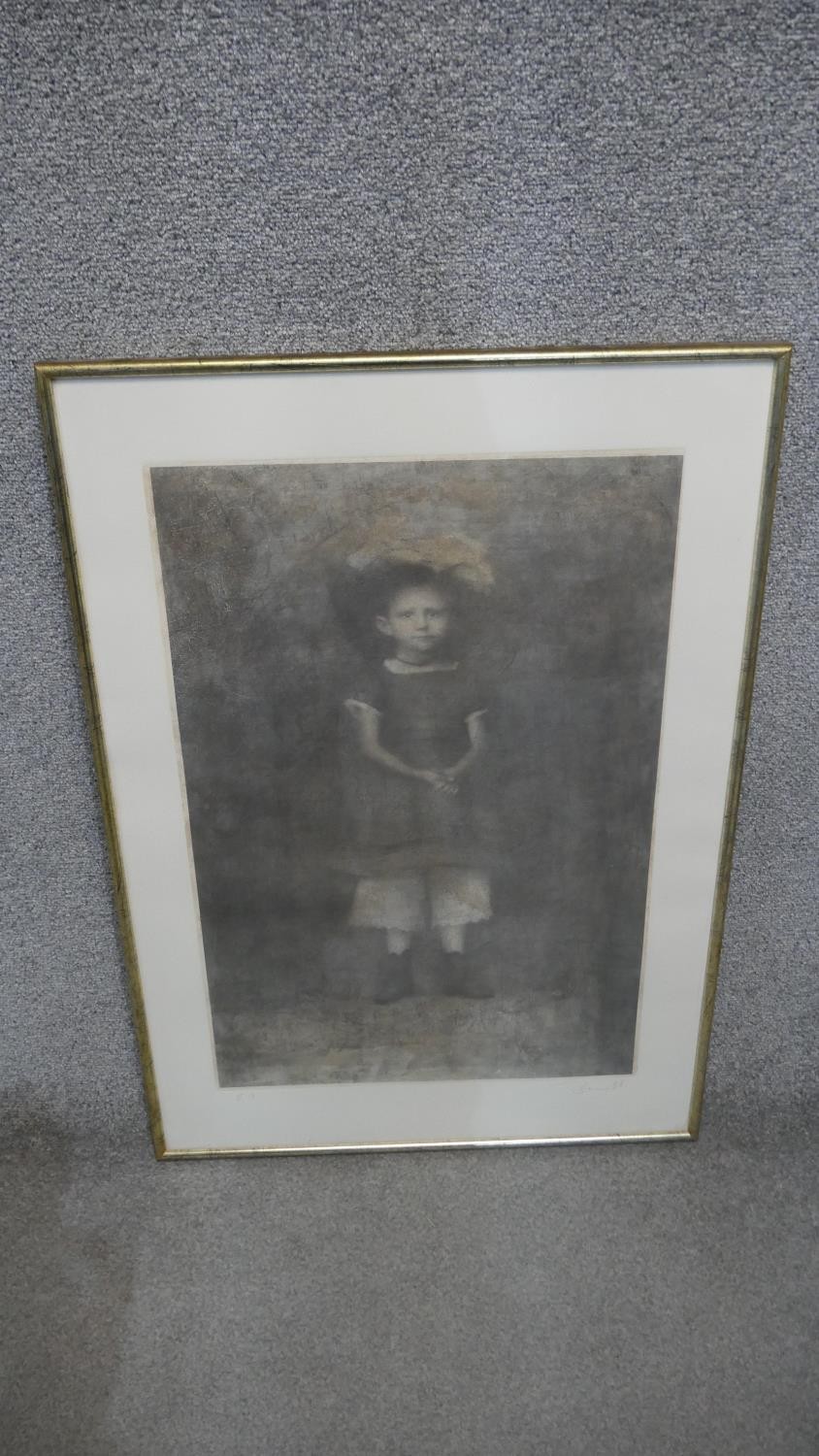 A framed and glazed signed artists proof lithograph of a young boy in a feather hat. Indistinctly - Image 2 of 5