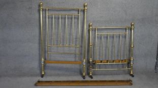 A 19th century brass bedstead for a single mattress. H.155 W.90 D.186CM