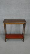 A vintage oak console table on barleytwist supports. H.70 W.68 D.28