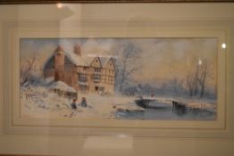 A framed an glazed watercolour on paper of a farm house in the snow with a lake and children