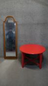 A contemporary arched and bevelled plate dressing mirror along with a painted occasional table. H.51