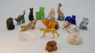 A collection of 14 Franklin Mint limited edition cat figures.