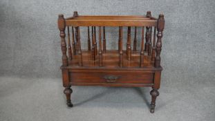 A 19th century walnut Canterbury fitted with base drawer on turned supports. H.50 x W.49 x D.34cm