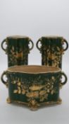 A pair of green ceramic vintage twin handled vases with gilded foliate and song bird design along