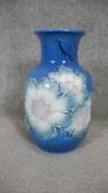 Julio Fernández for Lladro. A blue porcelain Poppy Flower design vase, (Limited edition 23 of 1500).