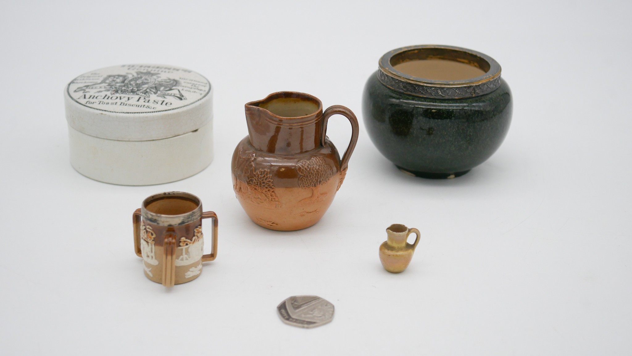 A collection of ceramics and porcelain. Including a miniatute Doulton tig with silver collar, - Image 2 of 4