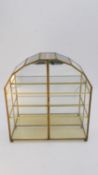 A vintage brass and glass curio cabinet with shelves and double opening doors with sliding catch.