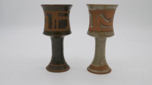 Two studio pottery glazed goblets with abstract design. H.15cm