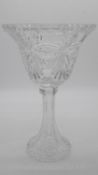 A very large cut crystal pedestal bowl with a stylised foliate design and cut design flared base.