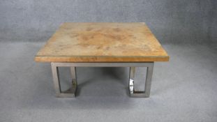 A vintage Pieff low coffee table with plate glass on burr elm top on chromium base. H.40 D.90cm