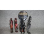 Four carved African hardwood tribal figures. H.50cm (Tallest)