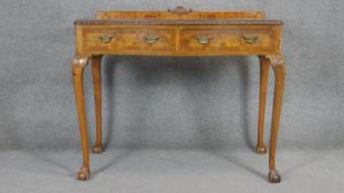 A mid century Georgian style burr walnut and crossbanded side table on slender carved cabriole