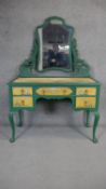 A mid century painted mirror backed dressing table with hand painted Chinese style floral