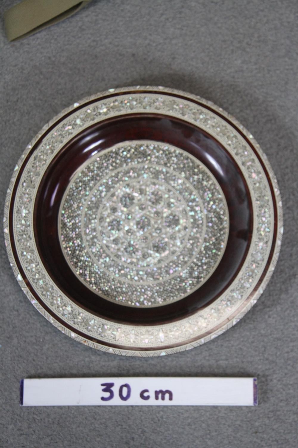 A large Egyptian micro mosaic mother of pearl and bone inlaid charger with a geometric design. Diam. - Image 3 of 3