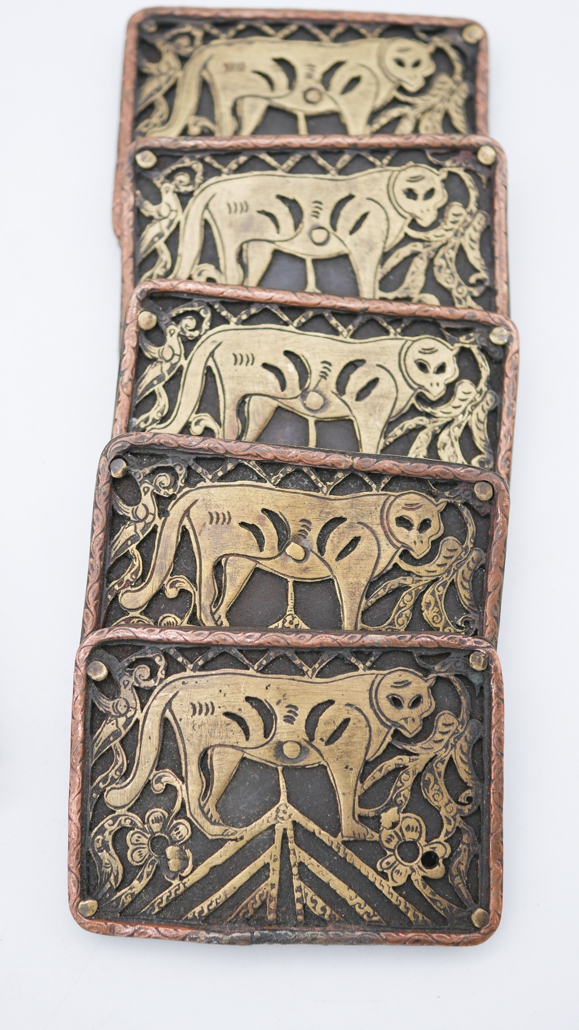 Two sets of metal Oriental buckles, one set of four with tiger motifs and the other set with a - Image 4 of 5
