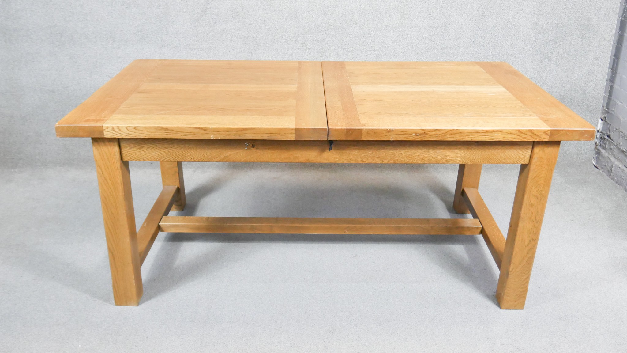 A contemporary John Lewis light oak planked top extending dining table on stretchered square - Image 2 of 5