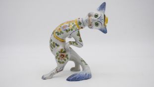 A hand painted majolica Louis Wain style ceramic cat. H.24cm