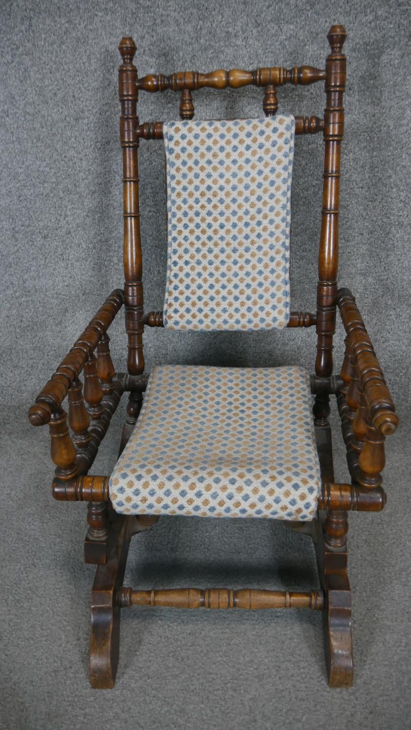 A 19th century American style child's rocking chair. H.70 W.40 D.40cm