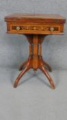 A 19th century style walnut envelope card table with floral satinwood inlay and frieze drawer on