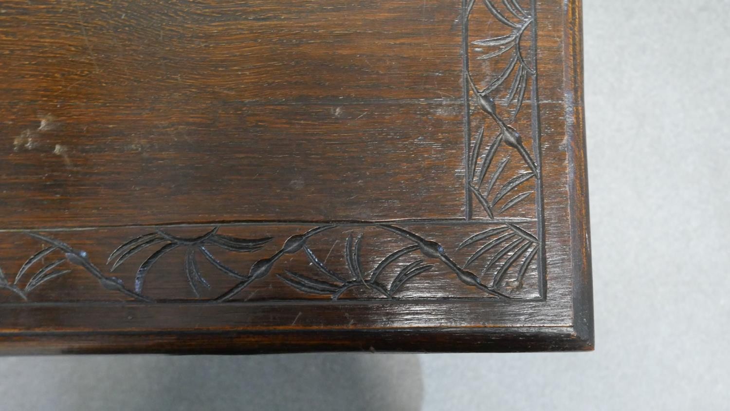 A mid century oak side table with mask carved frieze drawer on bobbin turned supports. H. 79 W. 69 - Image 5 of 5