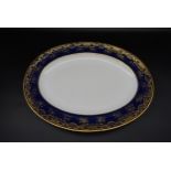 A large antique Wedgwood oval gilded stylised foliate design meat platter. Stamped Wedgwood. L.48