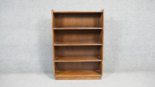 A vintage teak open bookcase on plinth base. H. 98 W. 69 D.17