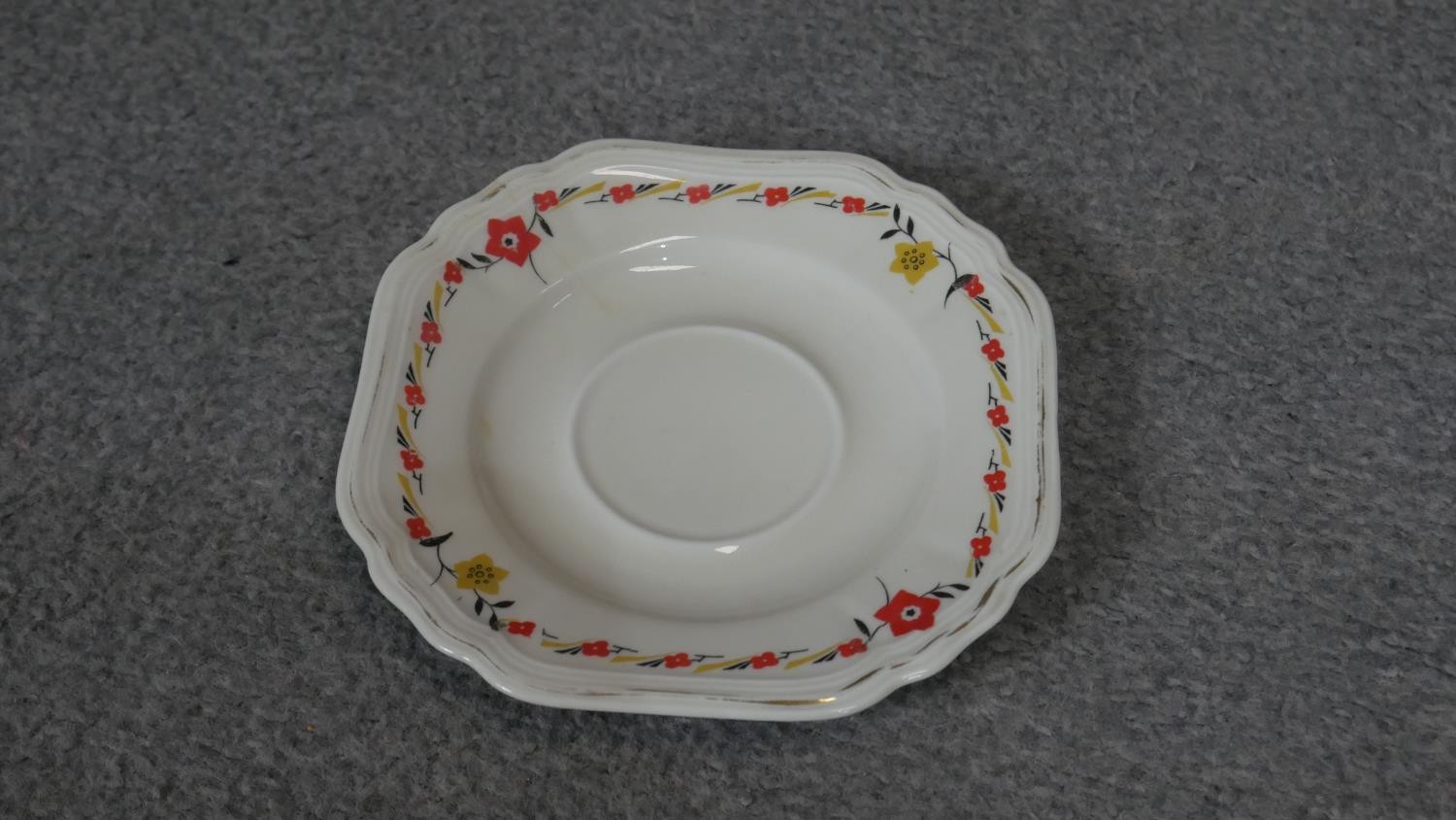 An Art Deco transfer printed floral design six person porcelain tea set (two cups missing), 11 - Image 4 of 5