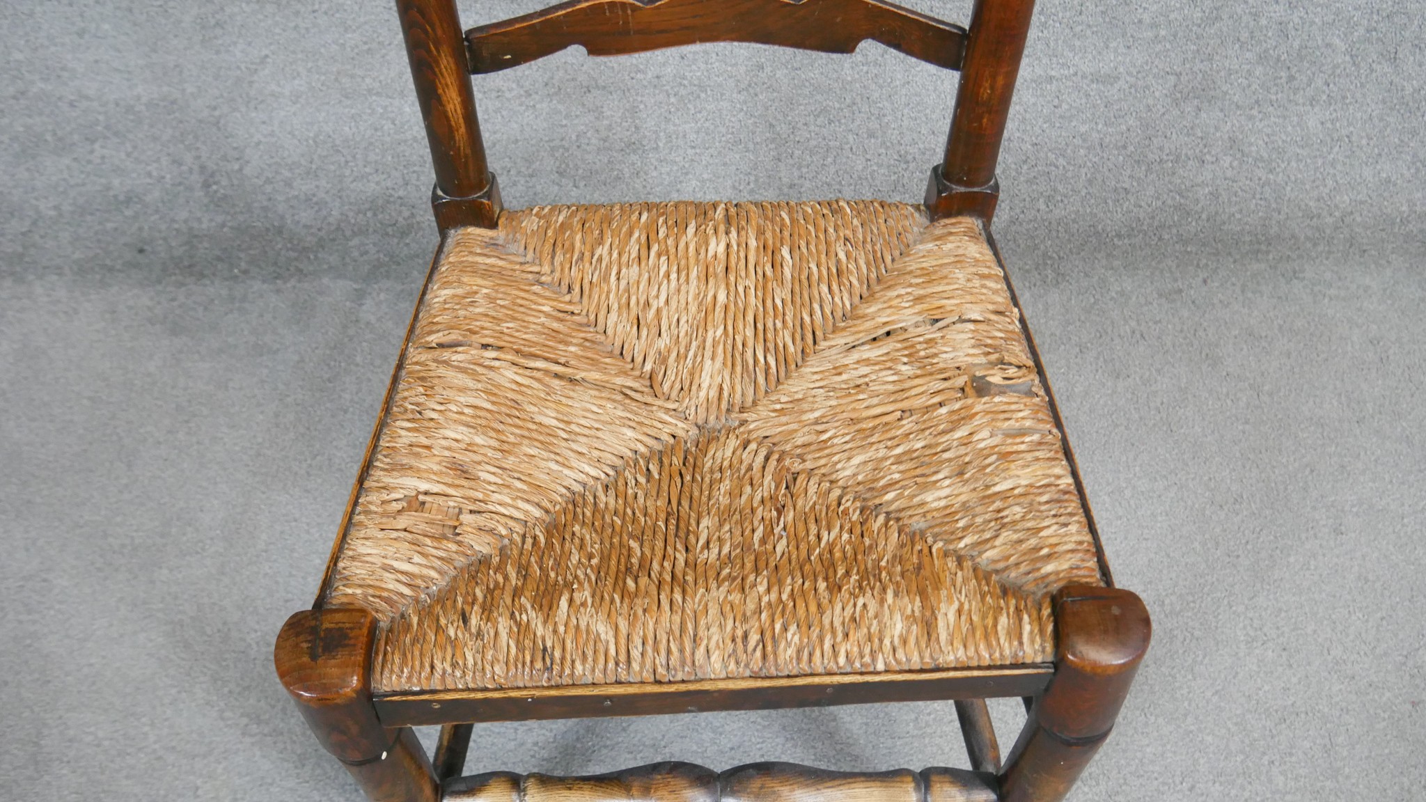 A pair of oak Lancashire style ladder back dining chairs with woven rush seats. - Image 4 of 6