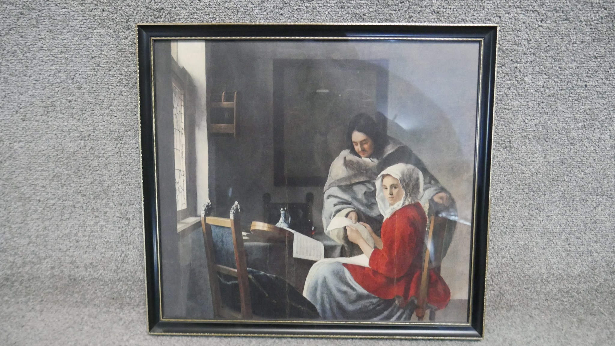 A framed and glazed coloured print of Johannes Vermeer oil on canvas titled 'Young Woman Interrupted - Image 2 of 3