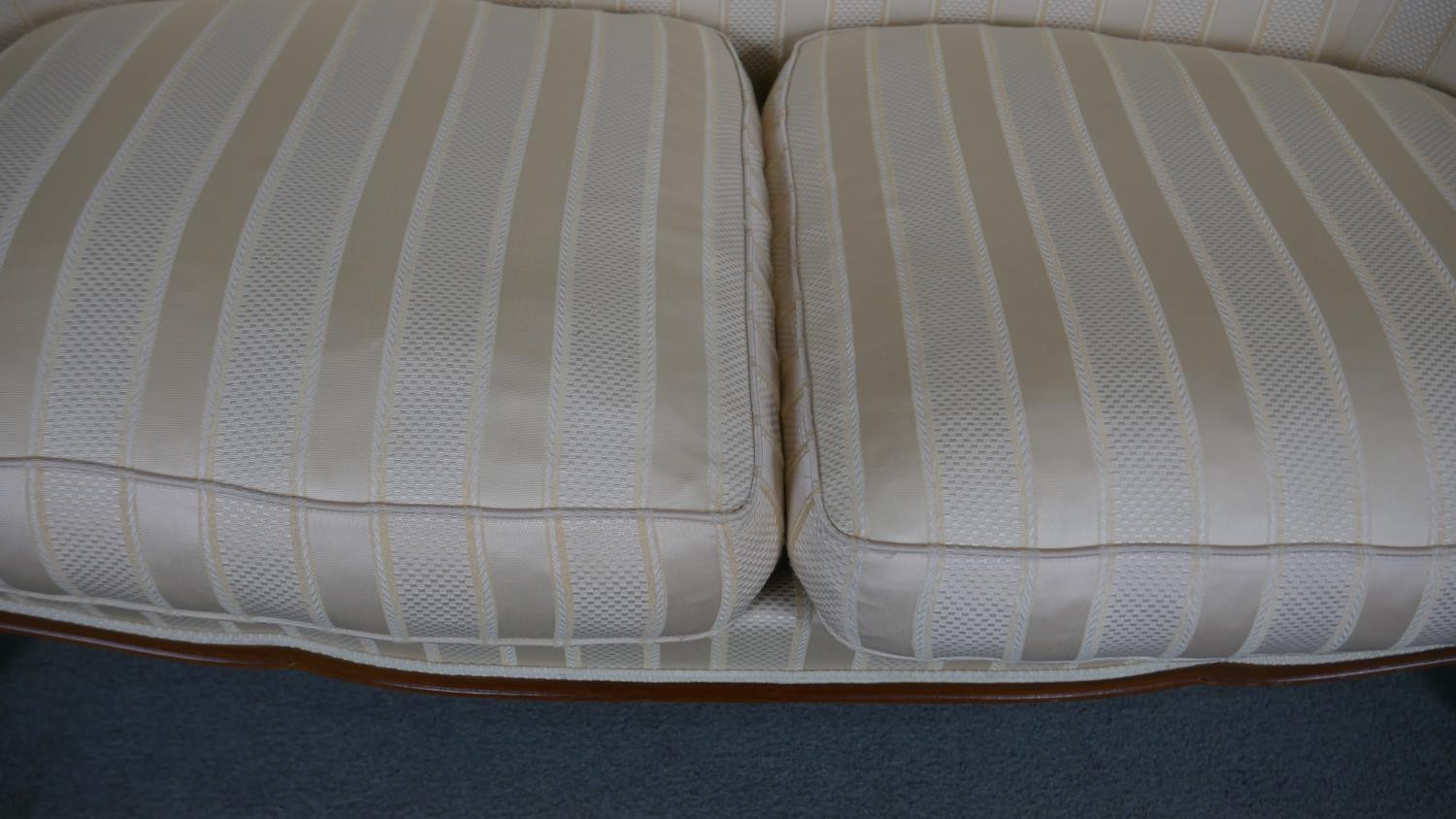 A Louis XV style two seater canape in striped upholstery on carved cabriole supports. - Image 5 of 5