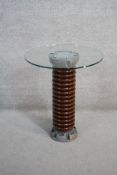 A plate glass topped occasional table on a pedestal from a glazed china high voltage insulator. H.74