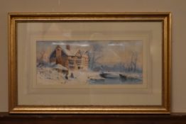 A framed an glazed watercolour on paper of a farm house in the snow with a lake and children