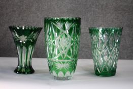 Three Bohemian heavy emerald cut to clear glass vases. All with conical shape, one with a floral