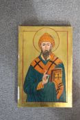 A hand painted and gilded religious Russian icon on panel. Signed to the back. H.30 W.20cm