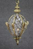 A brass framed ceiling chandelier with crystal drops. H.55 Diam.33cm.