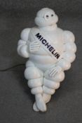 A light up Michelin Man Bibendum truck mascot on bracket. H.40 W.28cm