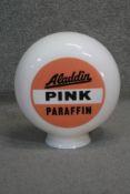 A vintage Aladdin Pink Paraffin opaque glass petrol pump globe. H.42 W.38