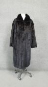 A vintage silk lined black mink full length coat. Size M/L.
